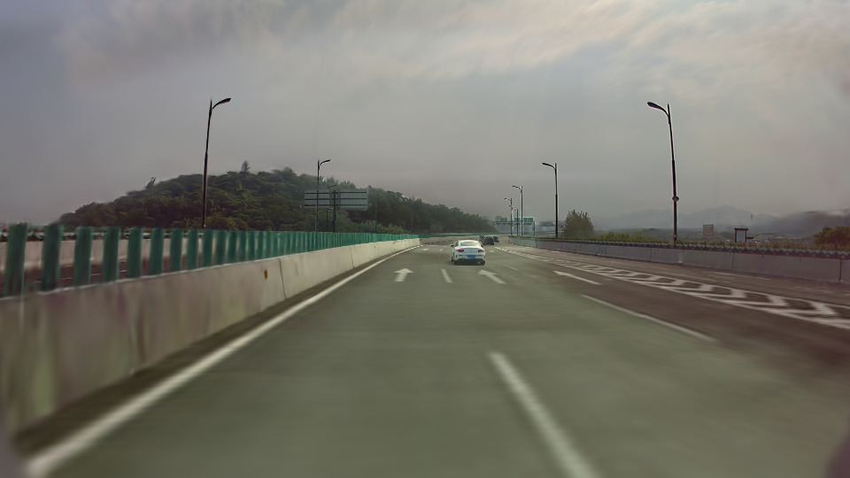 Rendering result without per-camera PPISP showing photometric inconsistency between cameras
